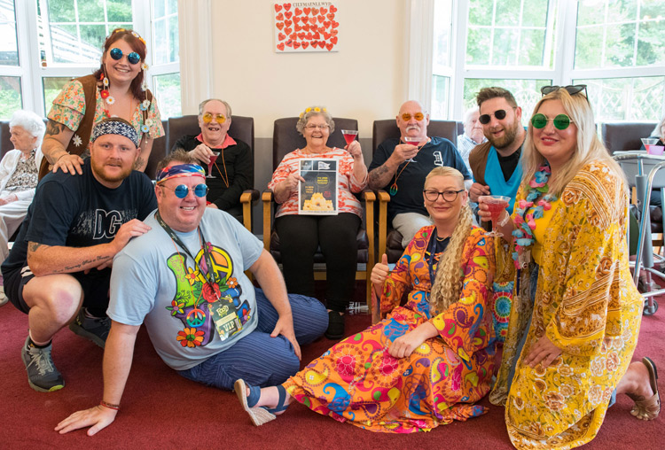 Men and women of Harlech bring flower power to residents of Pwll care home